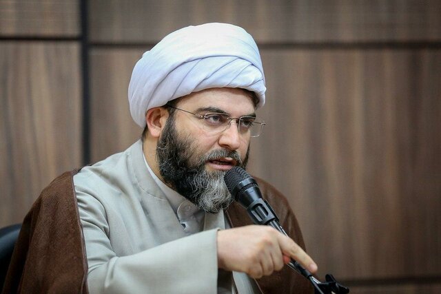 قمی